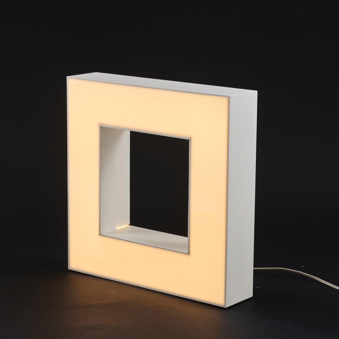 Aldo van den Nieuwelaar, 'Ming' wall / table light, 1968 (design): H. 42 x 42 x 9.5 cm. The Netherlands, c. 1980. Plastic, cream-white and white.
