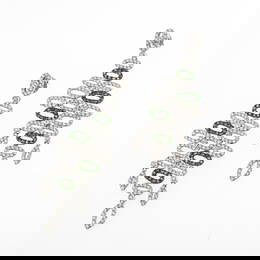 Expressive cocktail earrings set with diamonds and tsavorites