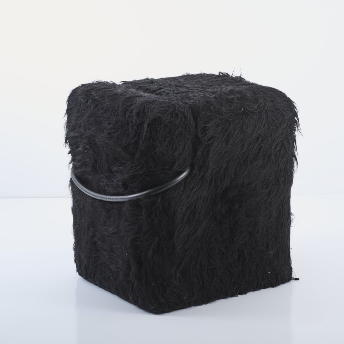 Nanda Vigo, 'Blocco' stool, 1970: <p>H. 59 x 48 x 52 cm. <br />Driade, Corsico.<br />Wood with foam padding, black faux fur, black leather.</p><hr><p>Literature:</p><p>Irace, Driadebook,