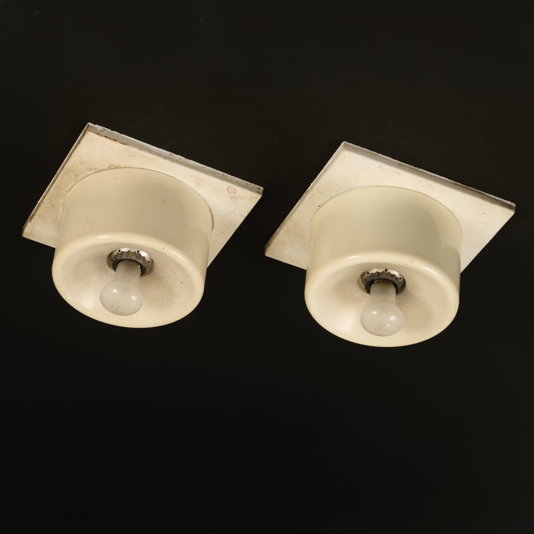 Cini Boeri, Two '268' ceiling lights, 1971: <p>H. 13 x 20.5 x 20.5 cm. <br />Arteluce, Milan. <br />Sheet metal, painted white. </p><hr><p>Literature:</p><p>Cf. Gramigna, Repertorio 1950-1980, Mil
