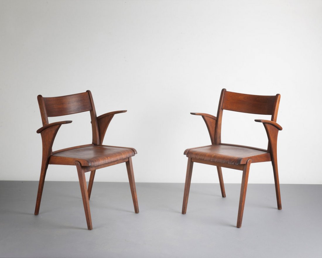 Bodo Rasch (in the style of). Pair of armchairs, 1950s.: Bodo Rasch (in the style of). Pair of armchairs, 1950s. H. 80.5 x 53.5 x 57 cm. Beech wood, beech plywood, stained dark.