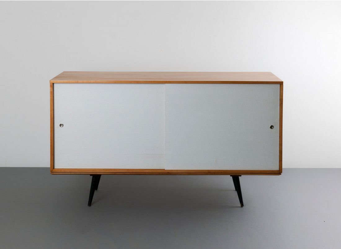 Paul McCobb. 'Planner Group' sideboard, 1950s. H. 87 x : Paul McCobb. 'Planner Group' sideboard, 1950s. H. 87 x 152.5 x 46 cm. Made by Winchendon Furniture Company, Winchendon, USA. Wooden construction of maplewood and maple veneer, legs black, sliding door