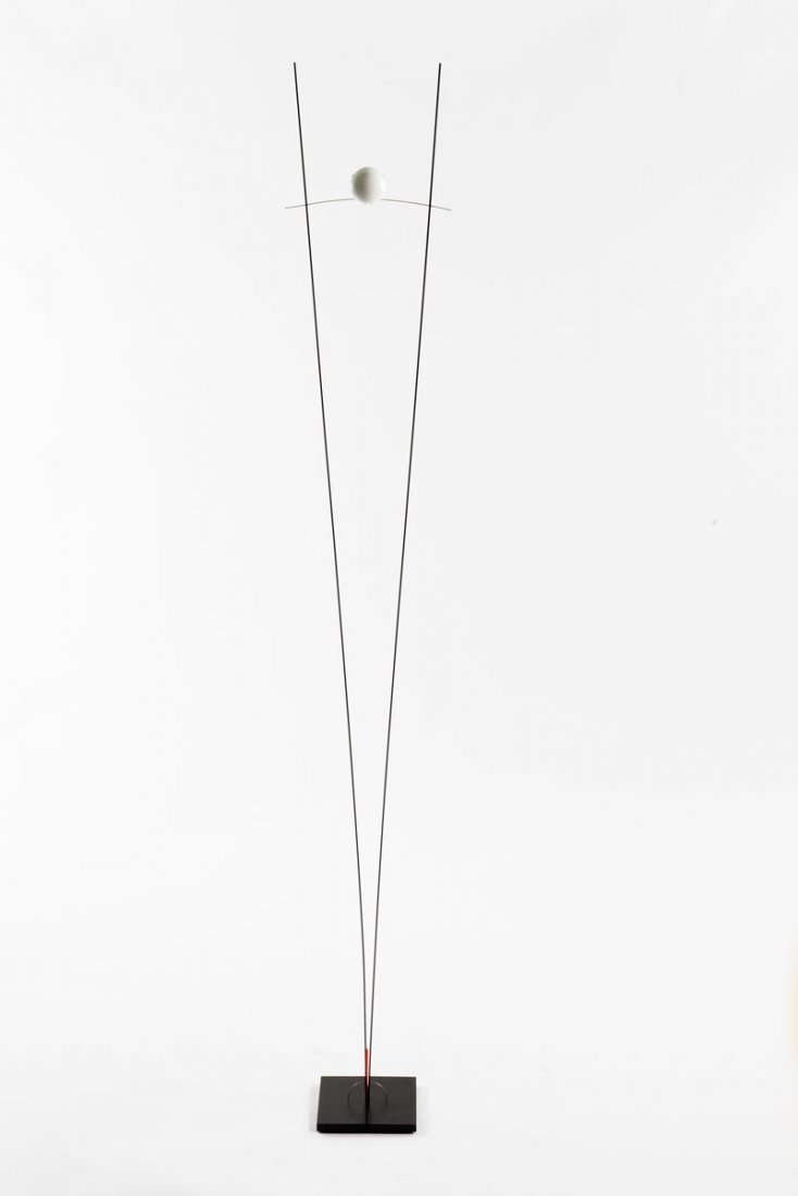 Ingo Maurer. 'Ilios' floor light, 1983. H .190 cm. Made: Ingo Maurer. 'Ilios' floor light, 1983. H .190 cm. Made by Design M Ingo Maurer Munich. Metal painted grey, white glass, fluorescent perspex insulation piece.