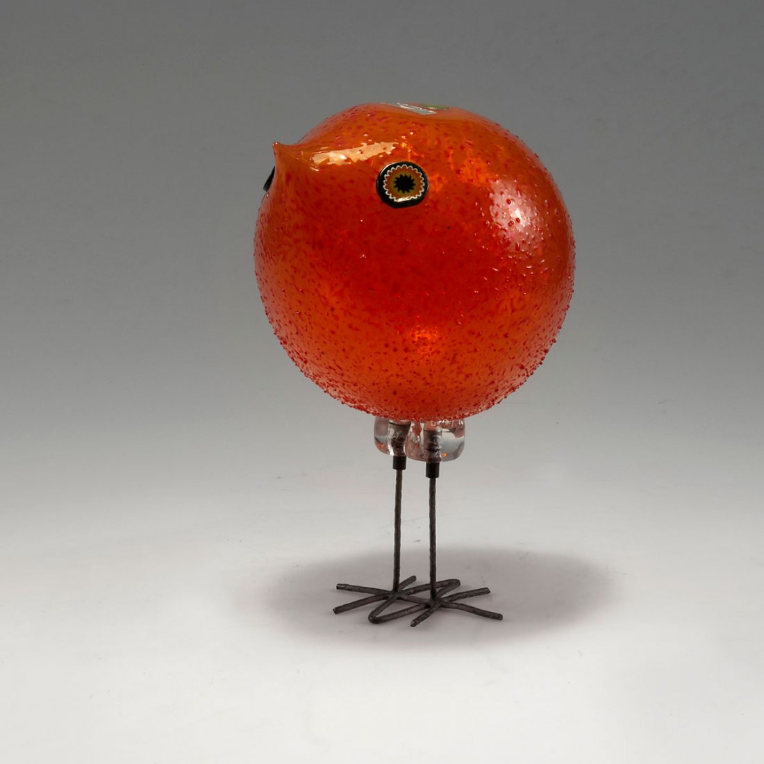 Alessandro Pianon. 'Pulcino' bird, 1962. H. 21.1 cm. Ma: Alessandro Pianon. 'Pulcino' bird, 1962. H. 21.1 cm. Made by Vetreria Vistosi. Glass, clear and orange, fused crushed glass, round murrhines as eyes, legs of hammered copper wire. Marked: VISTOSI make