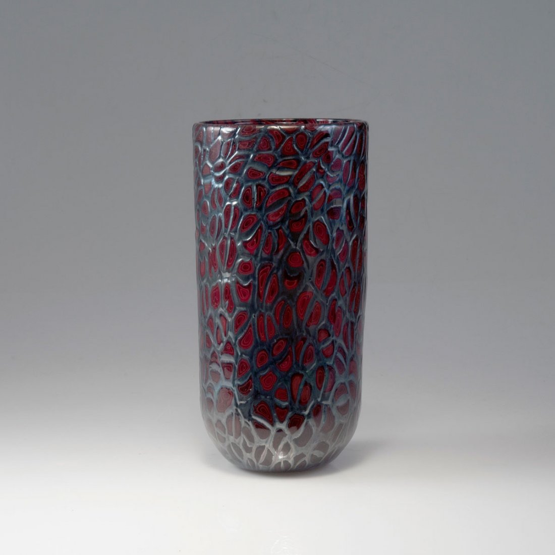 Vittorio Ferro. 'Murrine' vase, c2005. H. 29.1 cm. Clea: Vittorio Ferro. 'Murrine' vase, c2005. H. 29.1 cm. Clear glass, fused marbled murrhines, red and grey, partly iridescent.