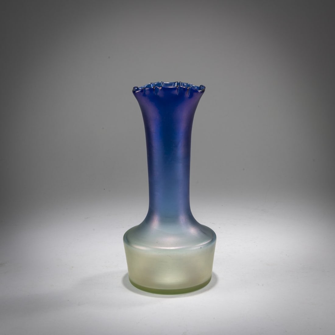 Loetz, Klastersky Mlyn, Vase 'Luna optisch', 1900: H. 21.3 cm. Colorless glass, optically blown, with a slight gradient of light green and dark blue, with a pearlescent matte finish. Literature: Cf. Mergl/Ploil/Ricke, Lötz Böhmisches Glas,