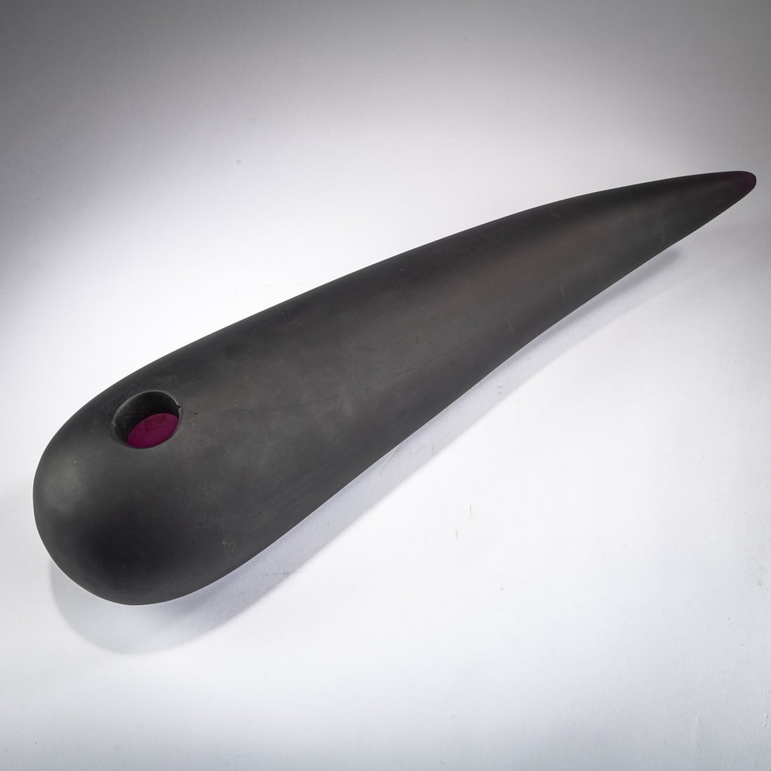 Philippe Starck , Vase 'Etrangeté', 1988: <p>L. 57.7 cm. <br />Cristallerie Daum, Paris. <br />Glass, violet. <br />Marked: Daum STARCK 8/75 (incised). </p><hr><p>Literature:</p><p>Cf. Phi