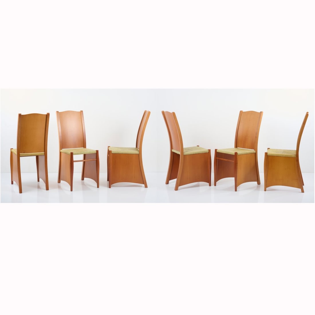 Philippe Starck, Six Chairs 'Bob Dubois', 1987: <p>H. 91.5 x 36 x 50 cm. <br />Driade Aleph, Corsico.<br />Cherry wood, pear wood, paper cord weave. <br />Marked: manufacturer's sticker (4x), manufacturer's logo (embossed).&