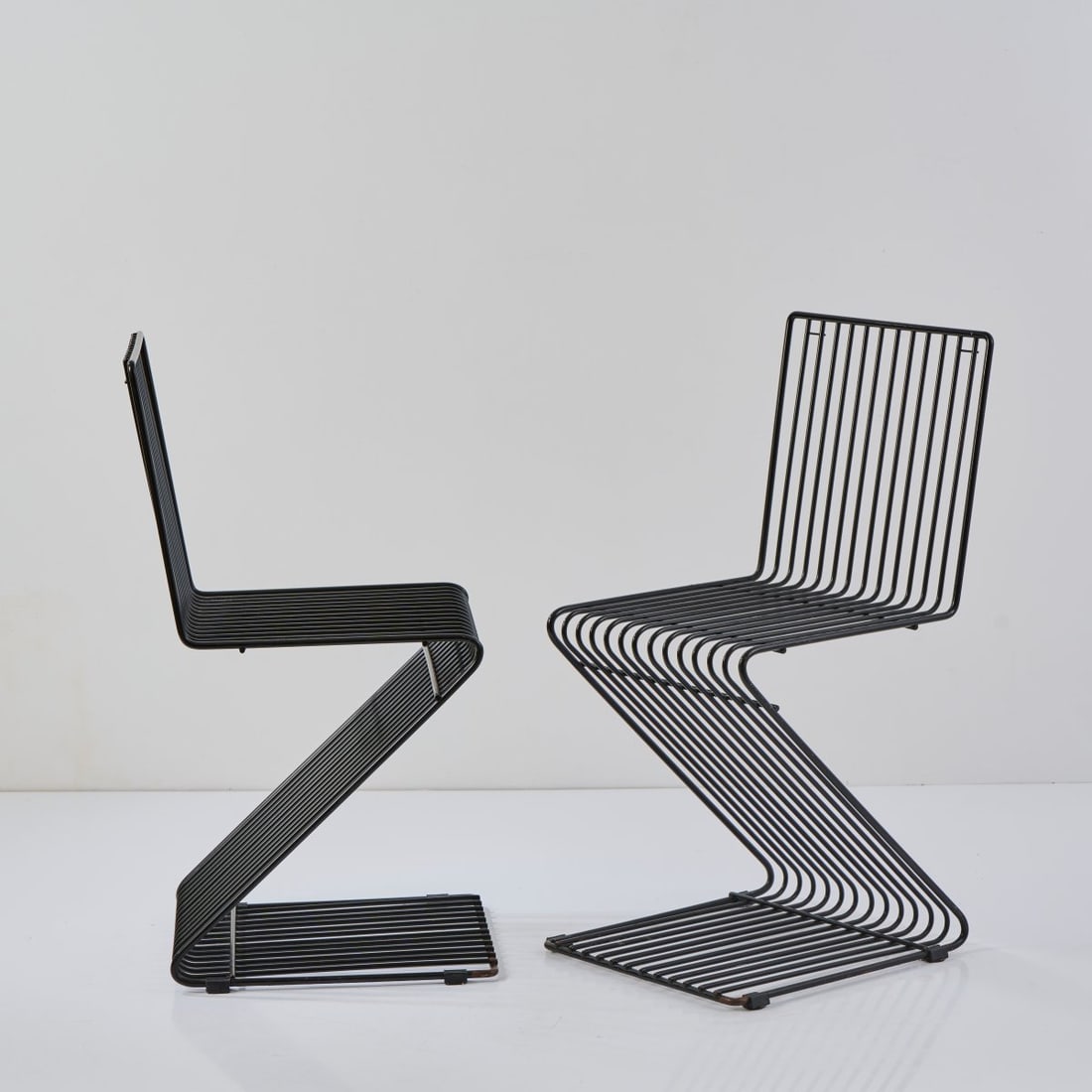 François Arnal, Two 'Z' chairs, 1970 (design): <p>H. 81 x 38 x 47 cm. <br />Atelier A, Paris.<br />Metal rods, painted black.</p>