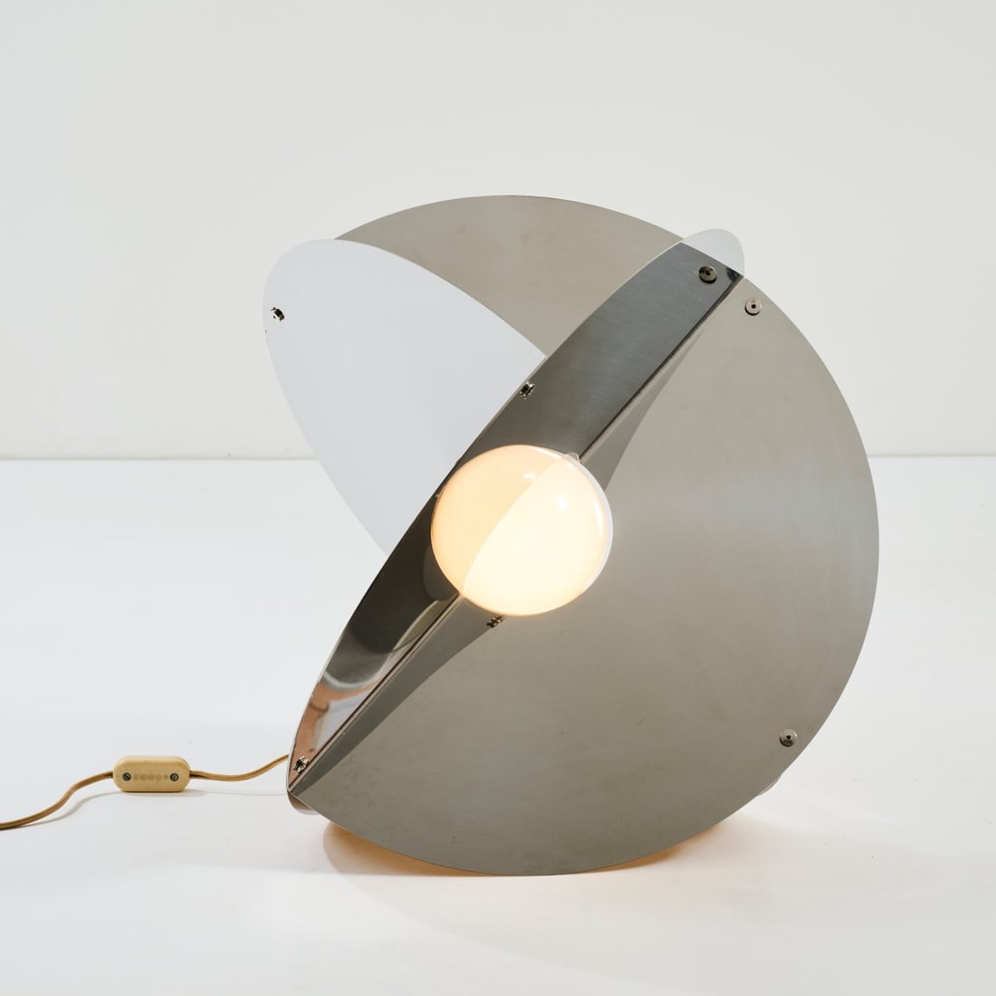 Rinaldo Cutini, Floor lamp 'Luna', 1970: <p>&Oslash; 49 cm. <br />New Lamp, Rome. <br />Sheet metal, chrome-plated. </p><hr><p>Literature:</p><p>Ferrari, Light, lamps 1968-1973: new italian