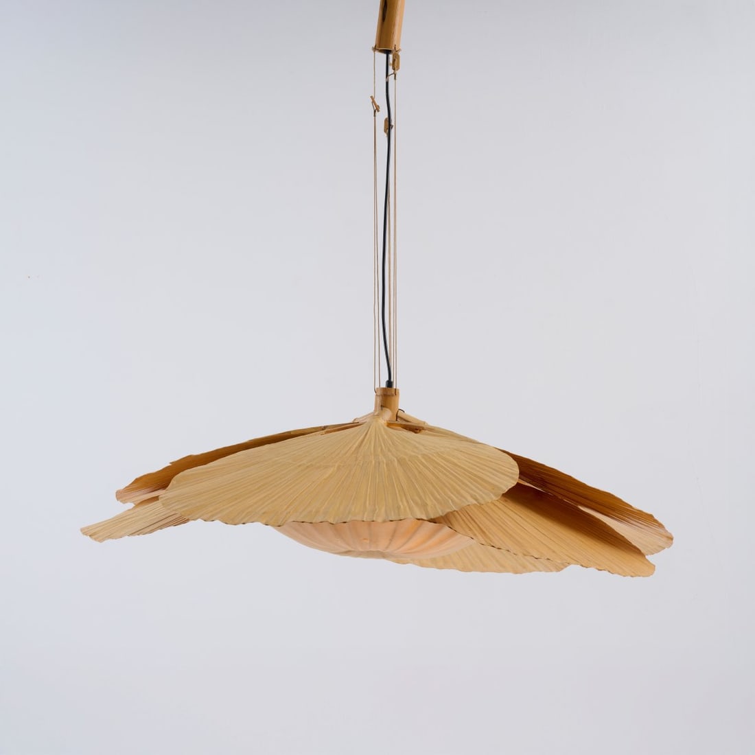 Ingo Maurer, Ceiling light 'Hana II' from the 'Uchiwa' series, 1974: <p>H. max. 100 cm, &Oslash; 110 cm. <br />Design M, Ingo Maurer, Munich. <br />Bamboo cane, rice paper, textile fabric, cream color.</p><hr><p>Literature:</p
