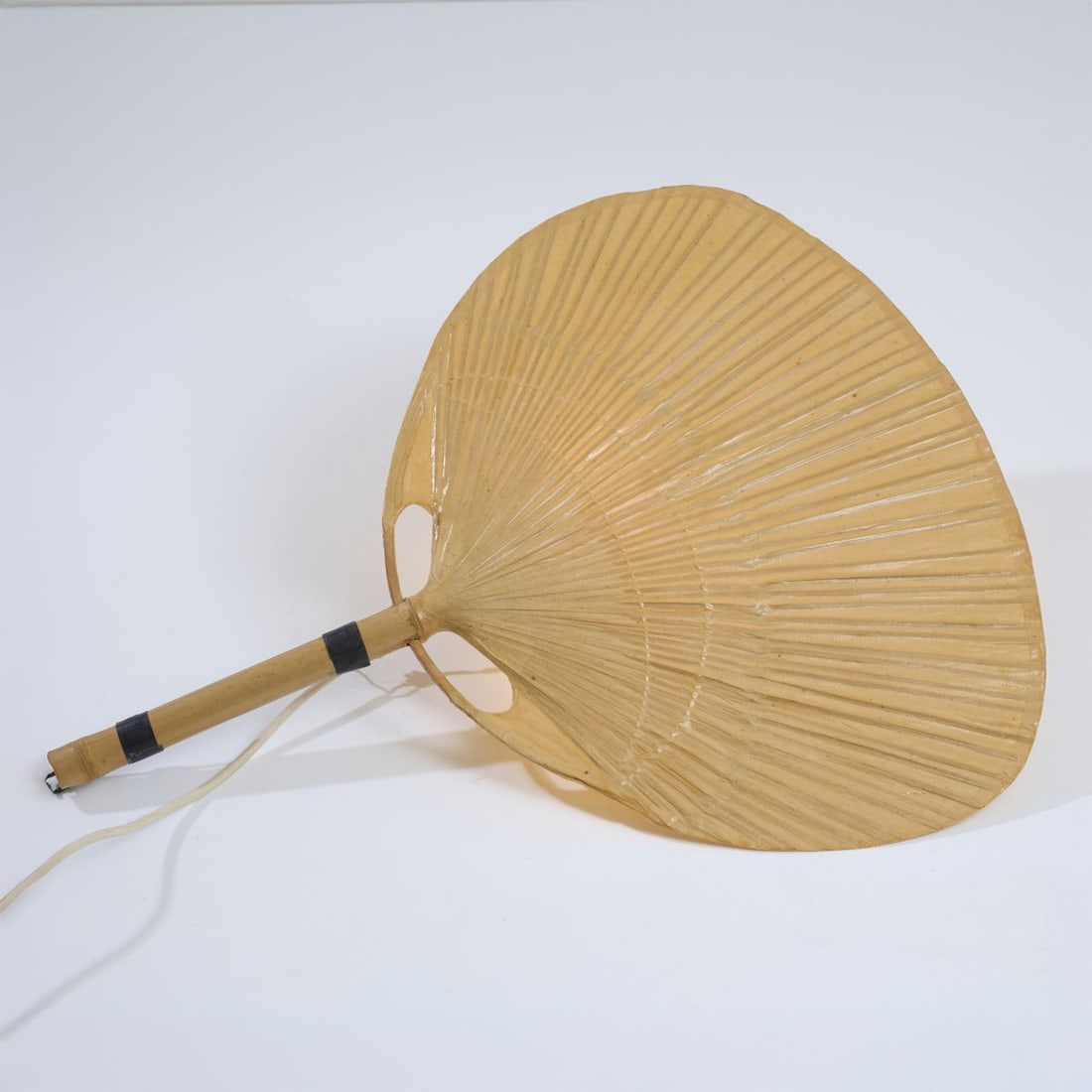 Ingo Maurer, 'Uchiwa III' wall light, 1973 (design): <p>H. 73 x 57.5 x 14 cm. <br />Design M, Ingo Maurer, Munich. <br />Bamboo cane, rice paper.</p><hr><p>Literature:</p><p>Bauer (ed.), Ingo Maurer. Makin