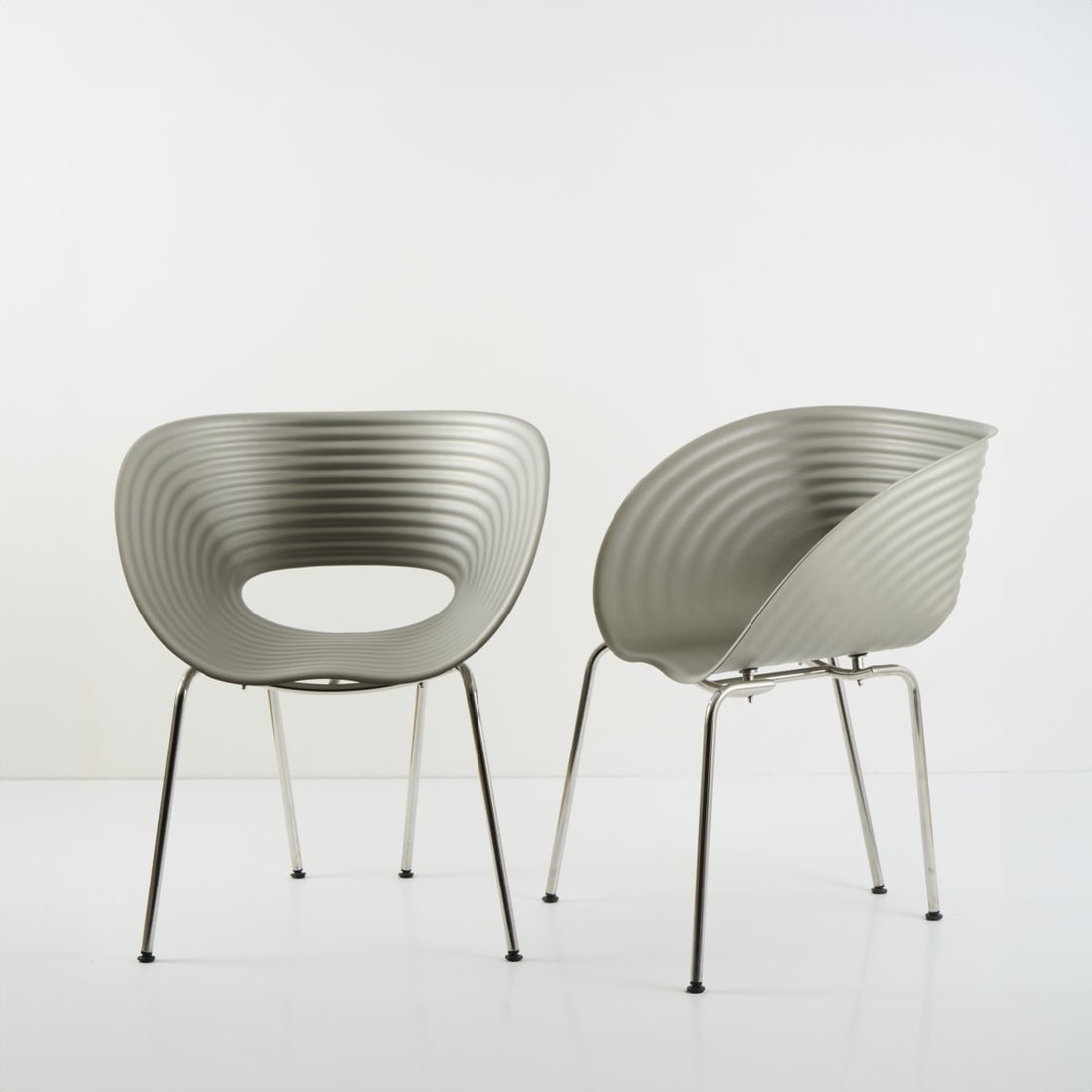 Ron Arad; Tom Vack, Two 'Tom Vac' chairs, 1997 (design): <p>H. 79.5 x 68.5 x 62 cm. <br />Arad Ron Associates, London, 1997. <br />Chrome-plated metal tube, aluminum sheet. Inscription: facsimile signature, numbers 118 and 129/500 (incised
