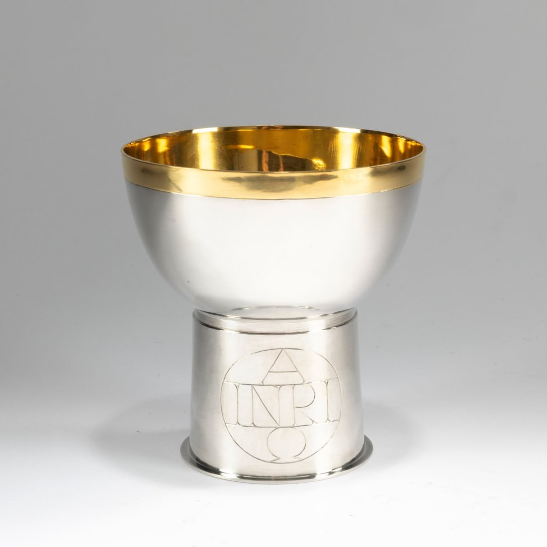 Gerd Rothmann (1941 Frankfurt a. M. - lives in Munich), Communion chalice, 1967: <p>Brass, silver-plated, fire-gilding, engraved with 'INRI' and the Alpha and Omega letters. <br />512 grams. H. 143 mm, &Oslash; 137 mm. <br />Signed: Rothmann 1967.</p>