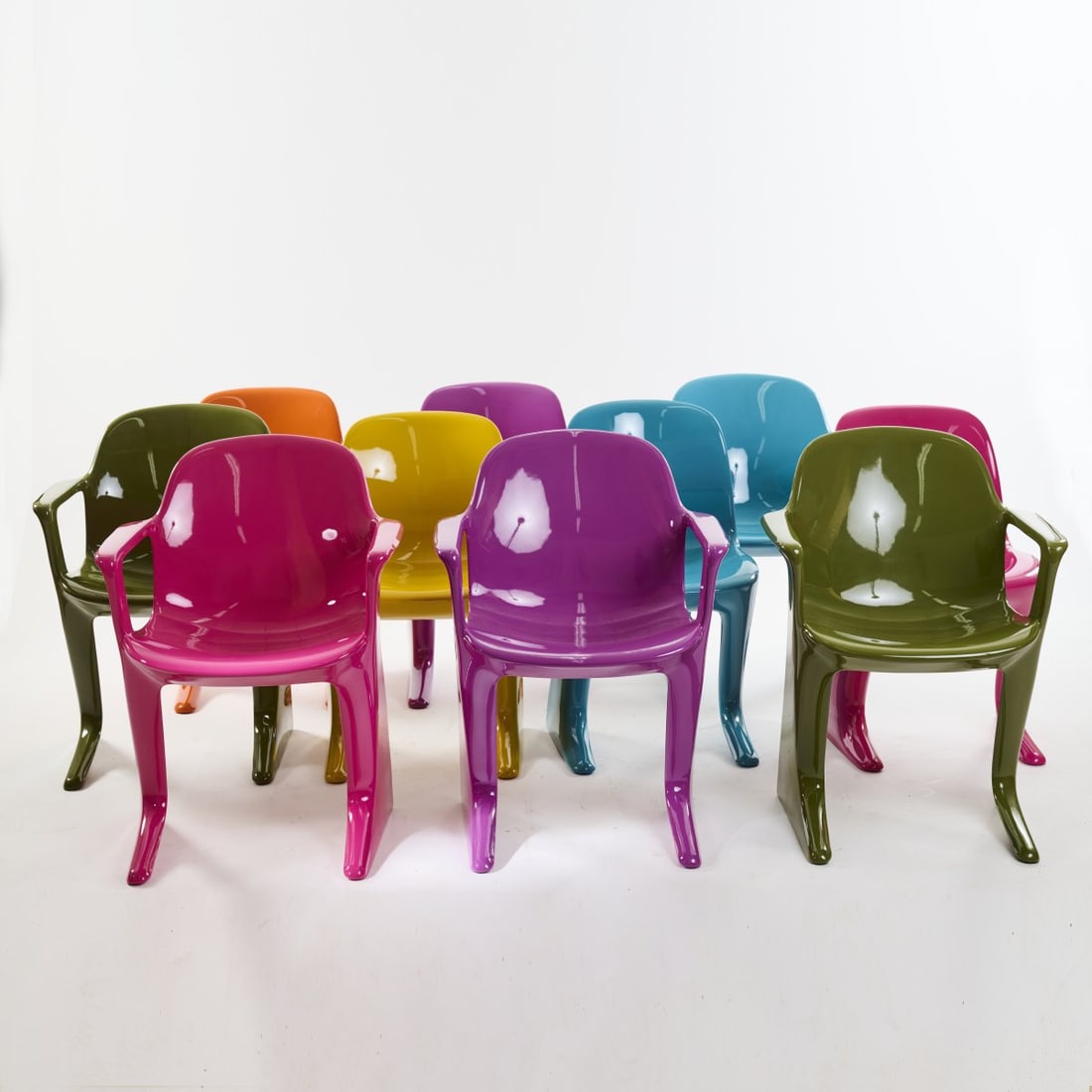 Ernst Moeckl, Ten chairs 'z.stuhl', c. 1968 (design): <p>H. 84 x 62/50 x 57 cm.<br />Pestel, Chemnitz, c. 2022. <br />Plastic (polyurethane foam) orange, green, yellow, blue, violet and pink.</p>