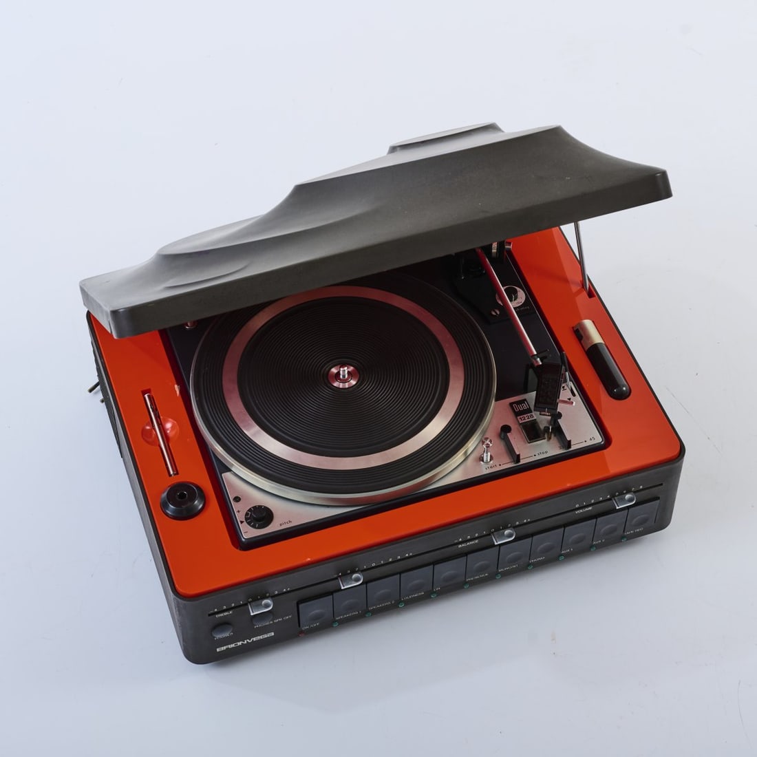 Marco Zanuso; Roberto Lucci & Paolo Orlandini, Record player 'Fonoamplificatore Concetto 101',: <p>H. 19.5 x 45 x 34 cm. <br />Brionvega, Milan. <br />Black lacquered plastic, red enameled sheet metal. <br />Marked: Brionvega.</p><hr><p>Literature:</p