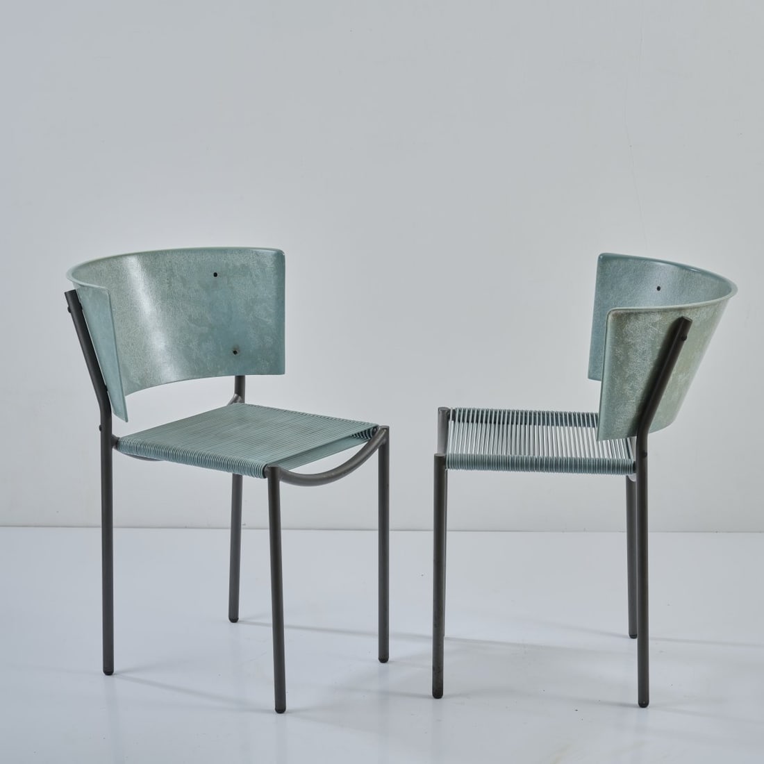 Philippe Starck, Two chairs 'Lila Hunter', 1988: <p>H. 74.5 x 51.5 x 55.5 cm. <br />XO, Paris. <br />Gray anodized metal tube, mint green fiberglass-reinforced plastic, mint green nylon strap. </p>