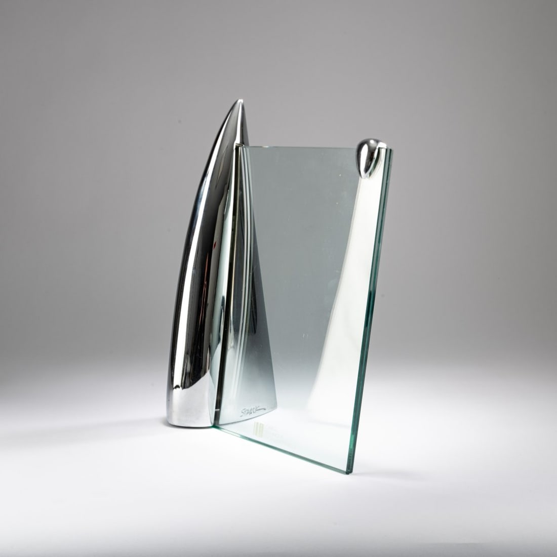 Philippe Starck, 'Shark' picture frame, 1989: <p>H. 35 x 30 x 15 cm.<br />Presence, Paris for L'Oreal, Paris. <br />Aluminum, chrome-plated, clear glass, gray plastic. <br />Marked: Manufacturer's embossing with designer d