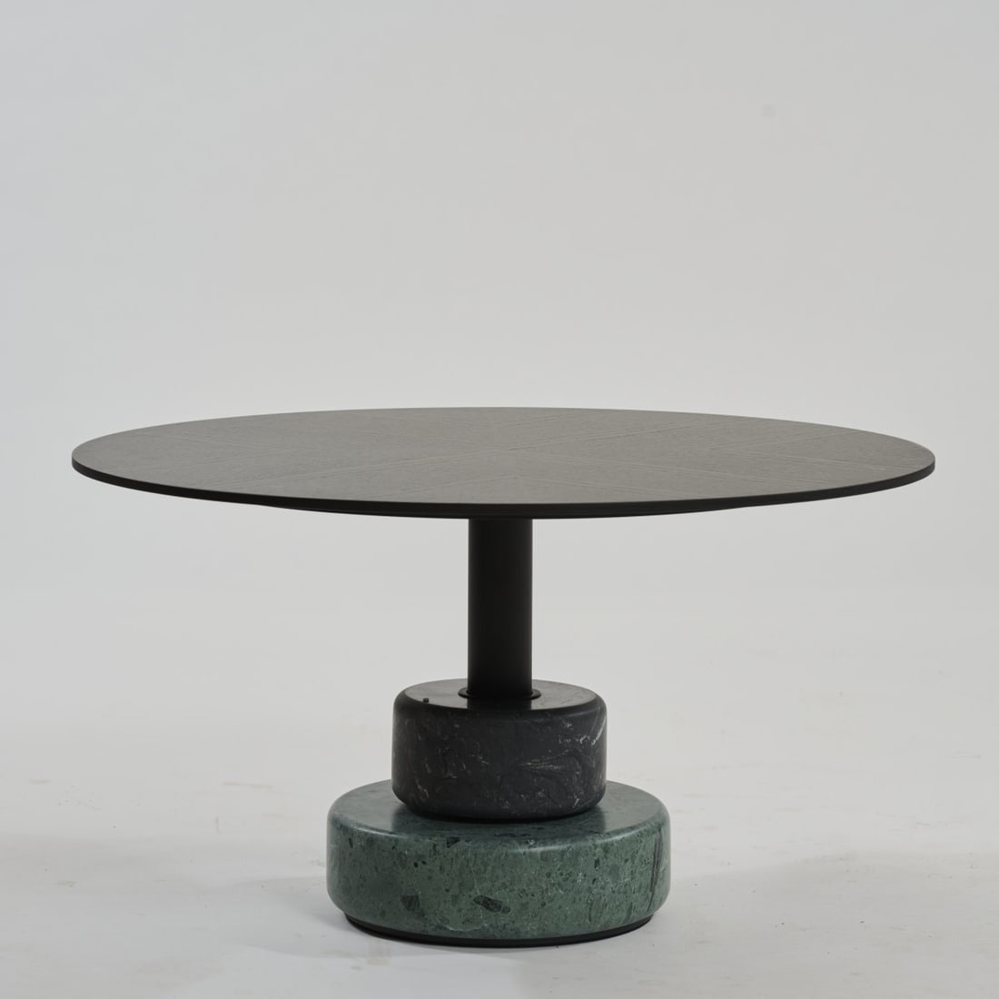 Giotto Stoppino; Lodovico Acerbis, Sofa table 'Menhir 1', 1980s: <p>H. 42.5 cm, &Oslash; 81 cm. <br />Acerbis, Bergamo. <br />Solid green and gray marble, black lacquered tubular metal, black lacquered ash wood. Marked: Manufacturer's plaque w
