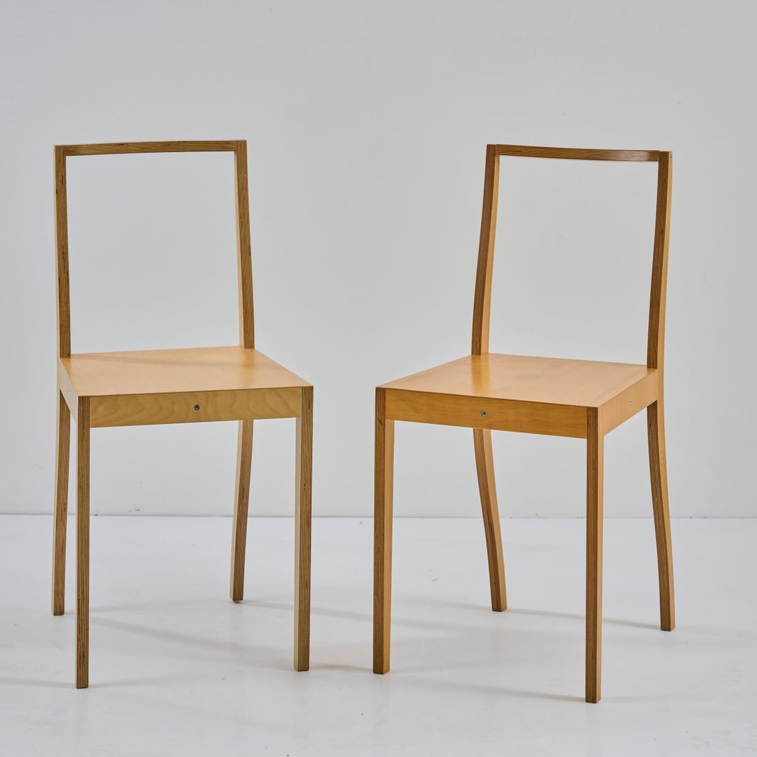 Jasper Morrison , Two chairs 'Ply Chair', 1988 (design): <p>H. 84 x 39 x 46.5 cm. <br />Vitra, Birsfelden, 2001. <br />Plywood. <br />Marked: Sticker with manufacturer and date information. </p><hr><p>Literature:<