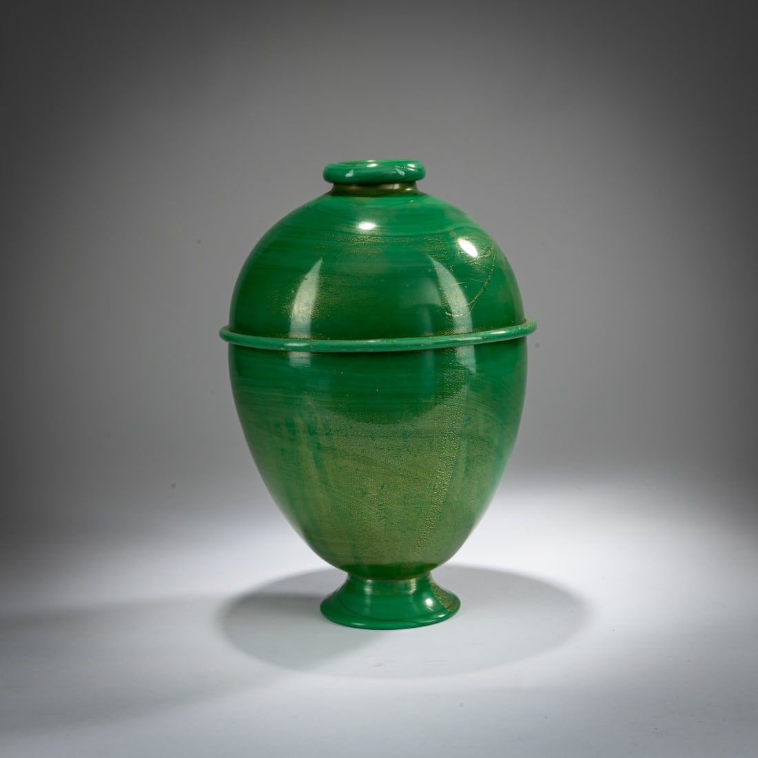 Napoleone Martinuzzi, Vase 'Crudo', around 1934: <p>H. 27 cm. Execution: Zecchin-Martinuzzi. Green, marbled glass with fused gold foil.</p><hr><p>Literature:</p><p>Franco Deboni, Murano '900, Milan and 1996, p. 33