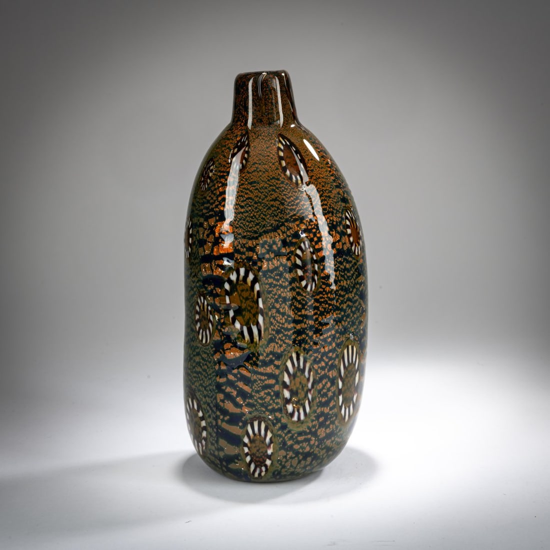 Aldo Nason, 'Yokohama' vase, after 1968: <p>H. 27 cm. Execution: Nason Vetri Artistici. Colorless cased glass, underlaid in cobalt blue, with gray-and-white striped concentric murrine and scattered foil inclusions in silver and copper