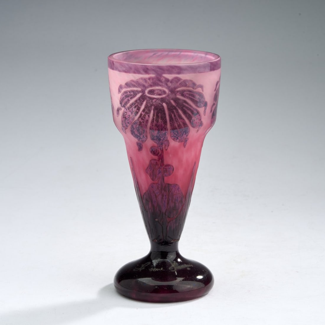 Schneider, Epinay-sur-Seine, 'Dahlias' goblet, 1923-26: <p>H. 17.8 cm. Cased glass, colorless with pink powder inclusions, light and dark violet enamel fusions. Etched decoration with dahlias. Foot signed: Le Verre Fran&ccedil;ais (needle etching