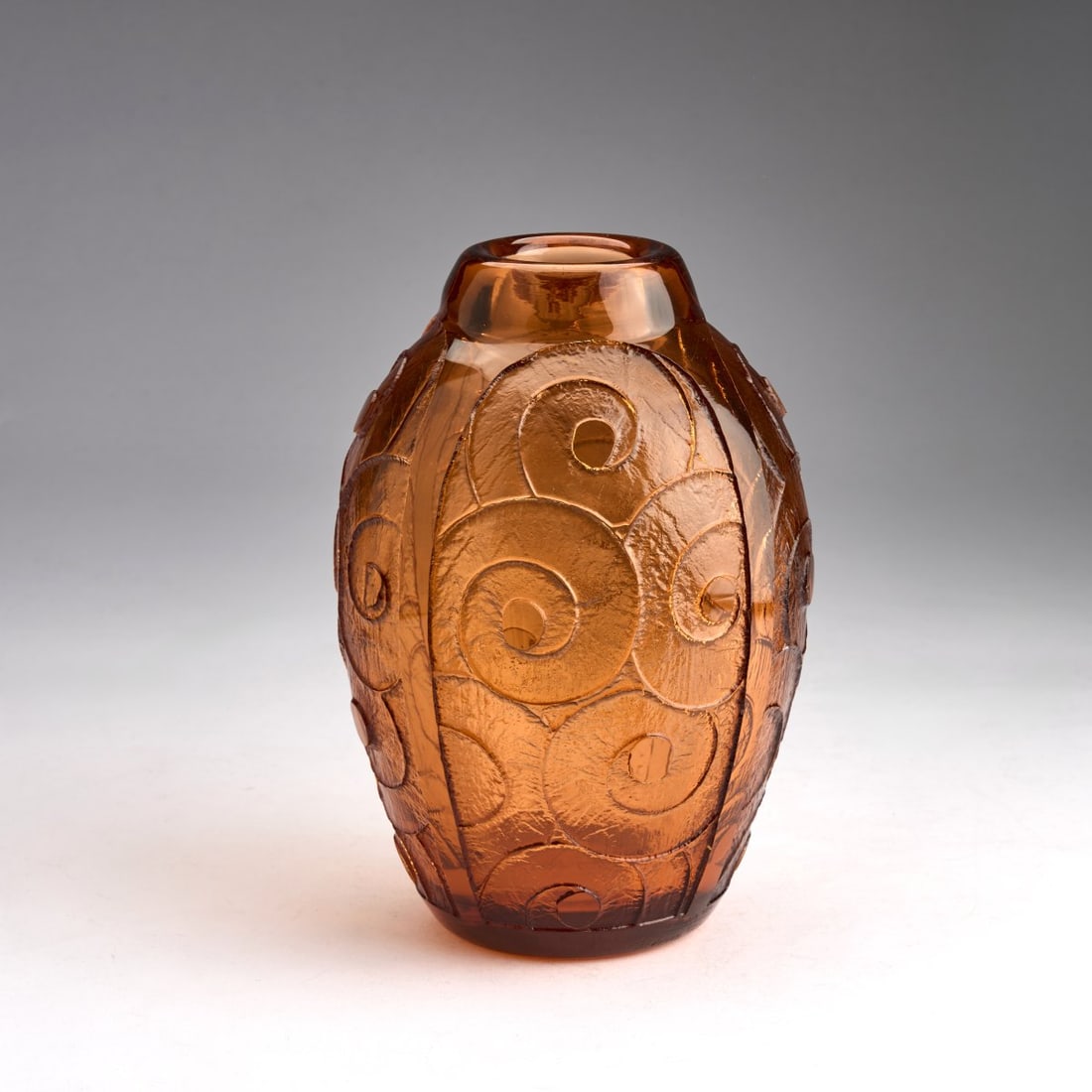 Schneider, Epinay-sur-Seine, Vase, c. 1930: <p>H. 19 cm. Orange glass. Etched volutes decoration. Stand signed: Charder, Le Verre Fran&ccedil;ais (needle etching). </p>