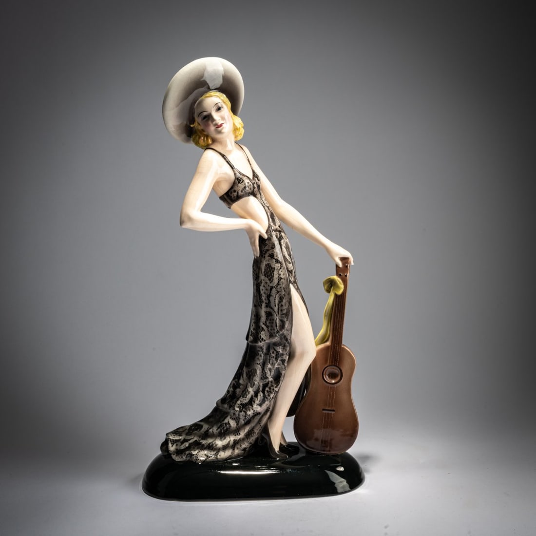 Stephan Dakon, 'Standing Elegant Lady', c. 1934: H. 42 cm. Execution: Friedrich Goldscheider, Vienna. Earthenware, polychrome glaze. Bottom marked: MADE IN AUSTRIA, Goldscheider Wien Dakon (black glaze stamp) 6704 446 2 (embossed). F., N. (handwritt