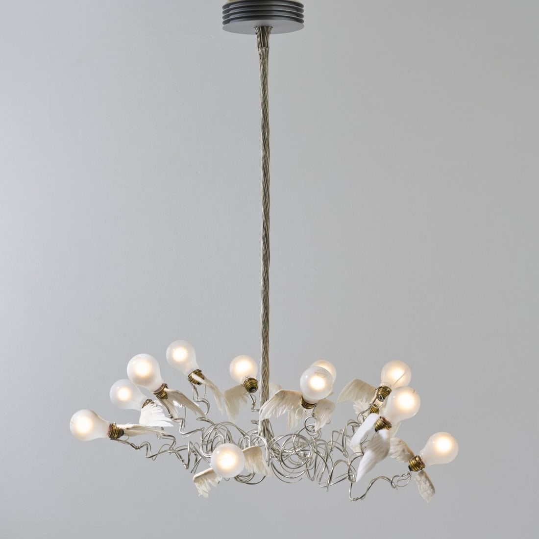 Ingo Maurer, Ceiling light 'Birdie', 2002 (design): <p>H. 95 cm, &Oslash; 75 cm. <br />Design M, Ingo Maurer, Munich. <br />Cast aluminum, chrome-plated metal wire, goose feathers.</p><hr><p>Literature:</p>