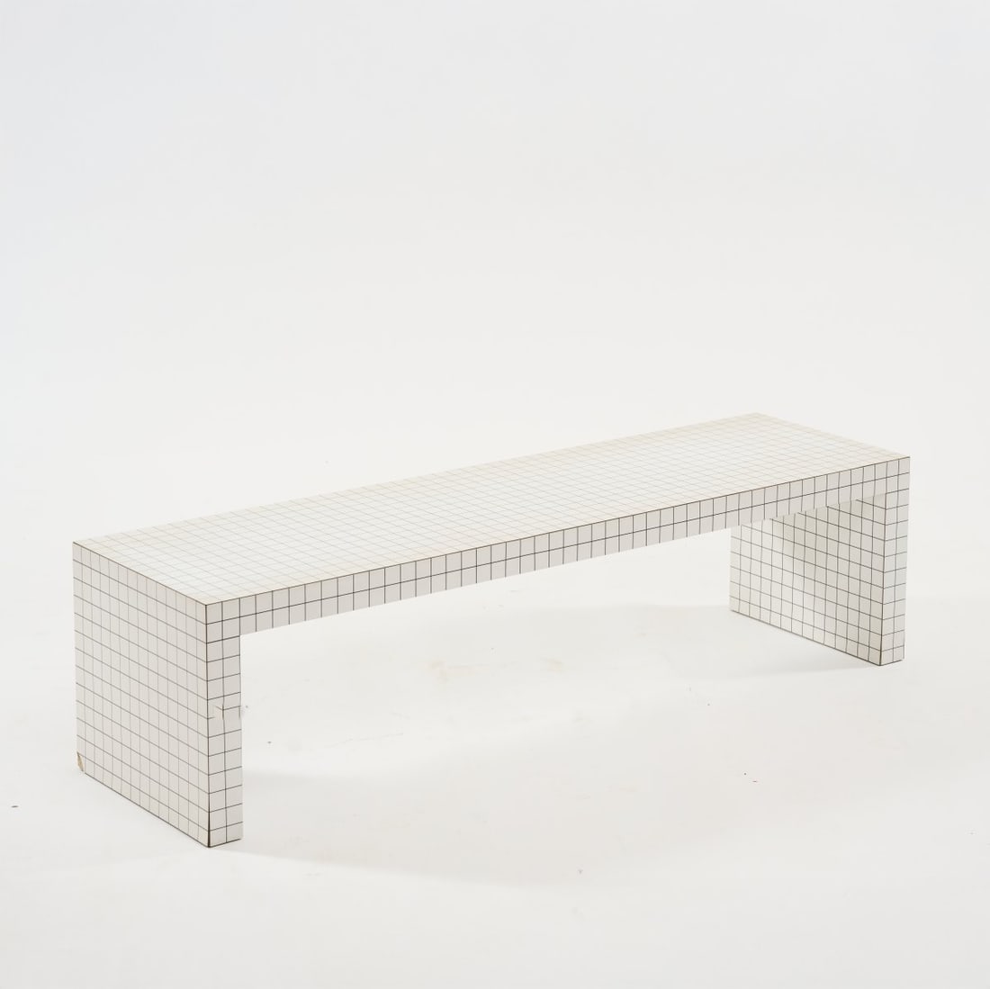 Superstudio; Piero Frassinelli; Alessandro Magris; Roberto Magris; Adolfo Natalini; Cristiano: <p>H. 39 x 148.5 x 41.5 cm. <br />Zanotta, Nova Milanese. <br />Wood, white plastic laminate printed with black lines.</p><hr><p>Literature:</p><p>Grami