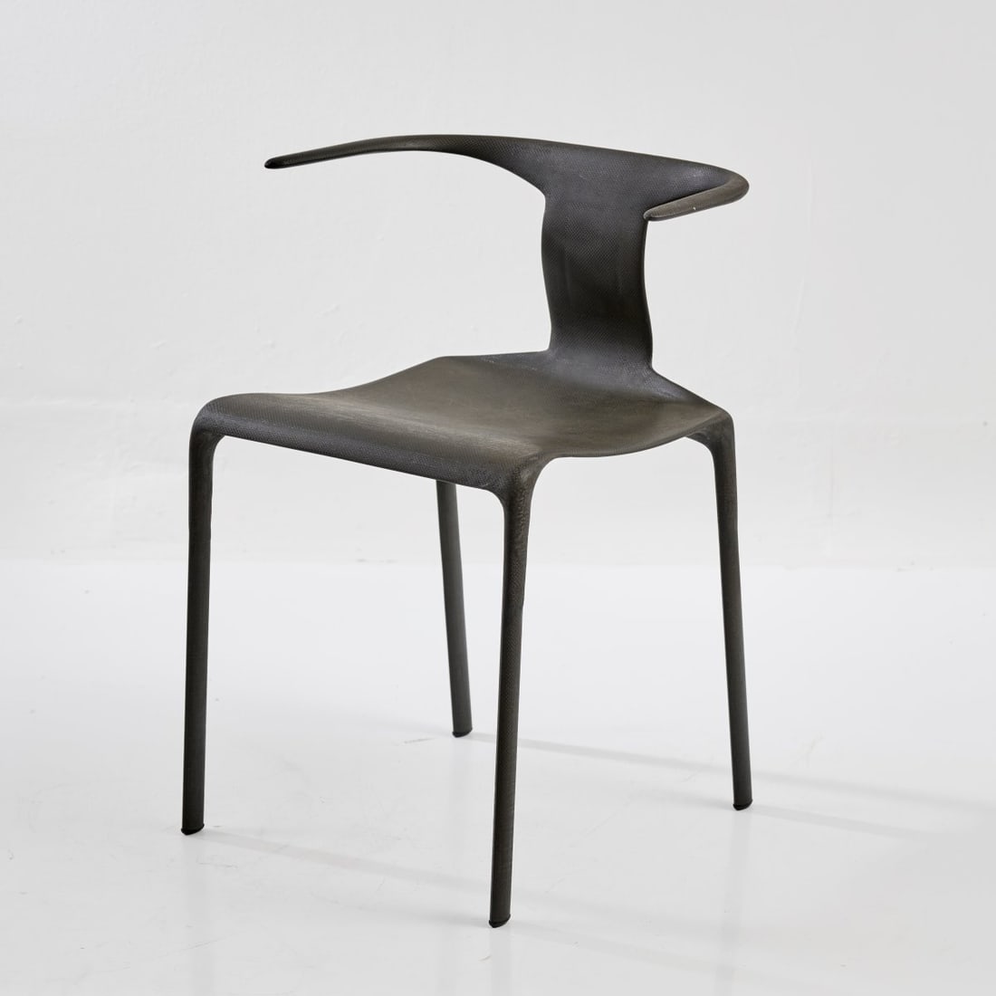 Alberto Meda, Chair 'Light Light', 1987: <p>H. 70.5 x 52.5 x 45.5 cm. Weight approx. 1 kg. <br />Alias, Bergamo, 1988. <br />Carbon fiber fabric, anthracite-black. <br />Marked: Manufacturer's plaque: Alias srl - Ital