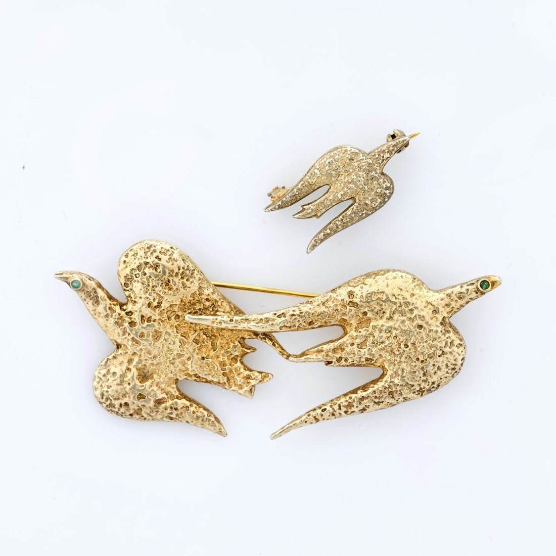 Georges Braque (after), Brooch 'Zétès et Calaïs' and small brooch 'Calaïs',: <p>Sterling silver, gold-plated, chrysoprase cabochons. <br />Large brooch 18.60 grams. 28 x 79 mm. Small brooch 3.27 grams. 19 x 27 mm. <br />Made by Cas Bernard, 1990s. <br />