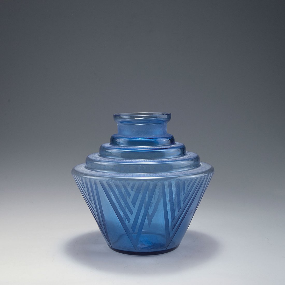 Vase, c1930: Daum Freres, Nancy. Vase, c1930. H. 18.2 cm. Blue glass, etched pattern. Signed: DAUM NANCY FRANCE, cross of Lorraine.
