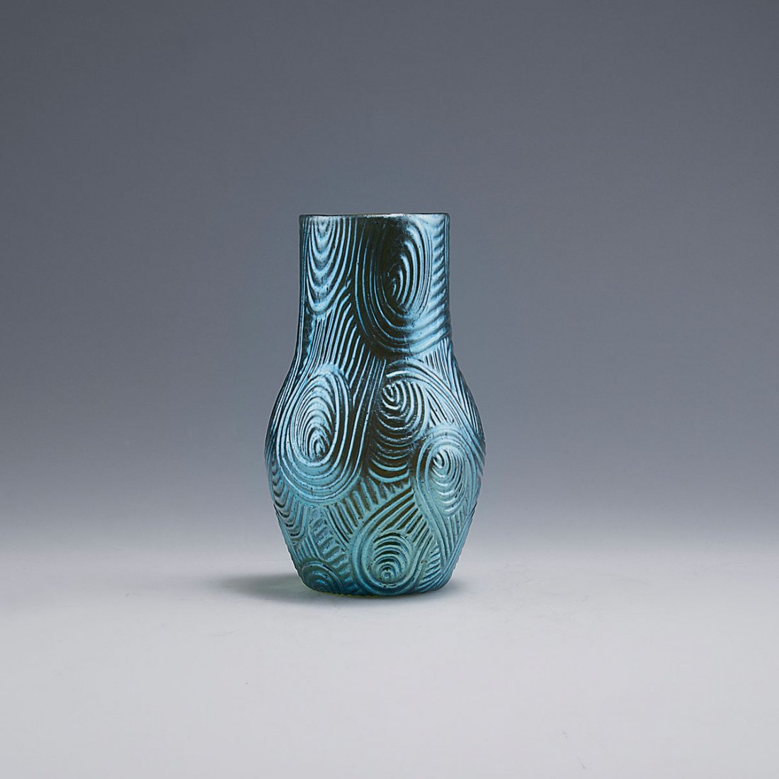 'Spiraloptisch' vase, c190: Loetz Wwe., Klostermuehle. 'Spiraloptisch' vase, c1905. H. 13.5 cm. Green glass, optically blown, silver yellow threads, matt mother of pearl lustre.