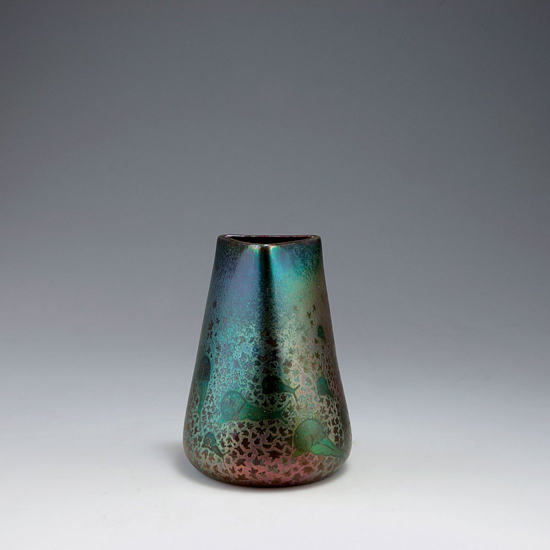 'Escargots' vase, c1895: Clement Massier, Golfe-Juan. 'Escargots' vase, c1895. H. 14.4 cm. Earthenware, strong lustre, green, purple, blue and bronze. Escargots. Signed: Clement Massier Golfe-Juan AM.