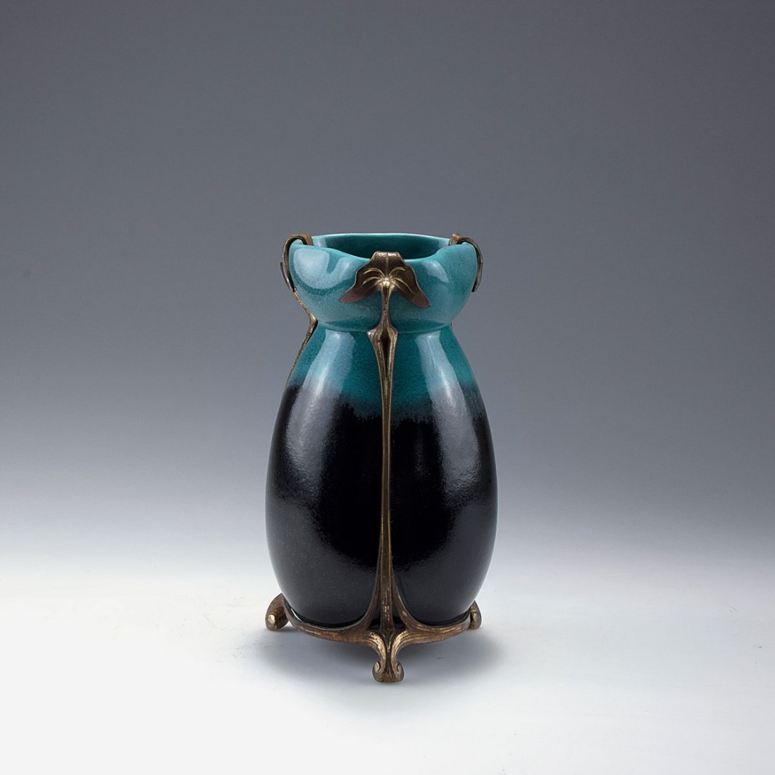 Vase with bronze mounting, c1900: Johann von Schwarz, Nuremberg. Vase with bronze mounting, c1900. H. 18.7 cm. Earthenware, glazed black and turquoise. Marked: 2443, O, R.