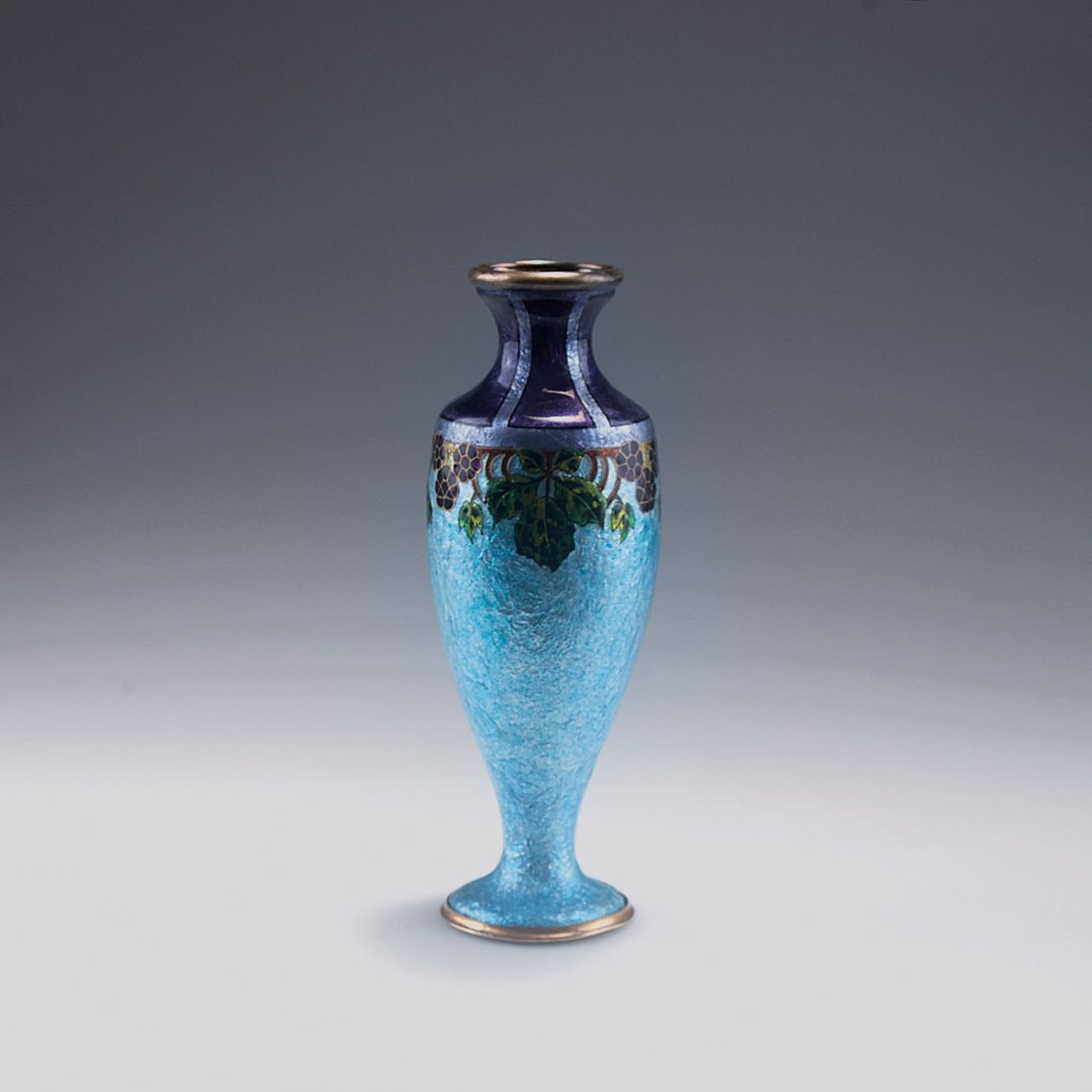 'Brambleberries' vase, c1925: Camille Faure, Limoges. 'Brambleberries' vase, c1925. H. 17 cm. Designed by Henriette Marty. Copper, applied silver foil, polychromatic enamel. Pattern with brambleberries, gold contours. Marked: FAUR