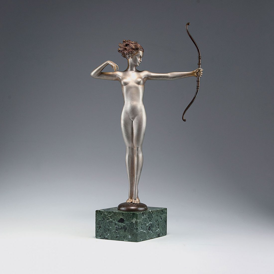 'Diana', c1930: Josef Lorenzl. Diana, c1930. H. 53.7 cm (incl. base). Bronze, silver patina, hair, arch and plinth reddish. Signed: Lorenzl.