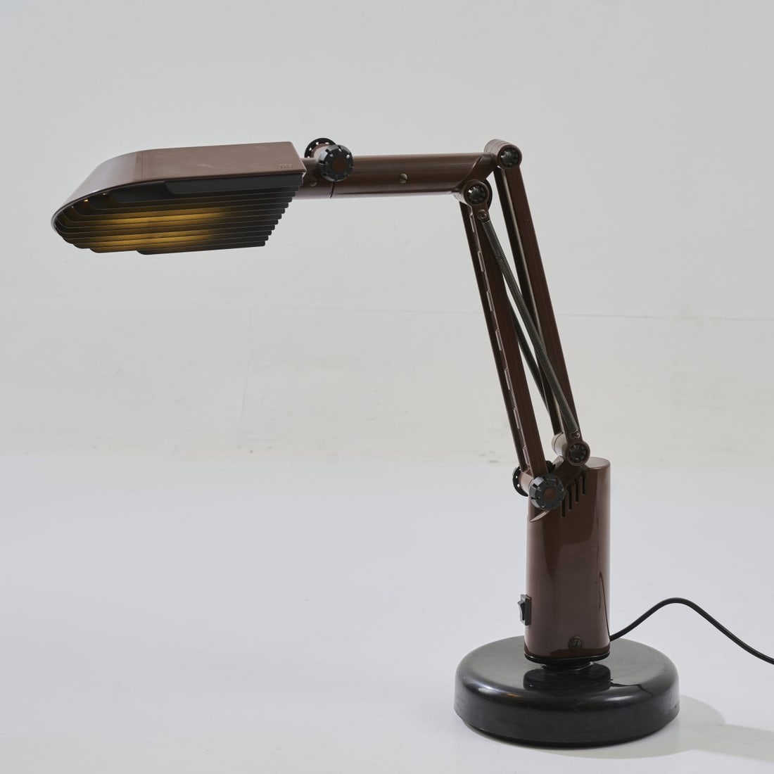Tom Ahlström; Hans Ehrich, Table light 'Lucifer', 1970s: <p>H. 46 cm.<br />A &amp; E Design, Fagerhults. <br />Plastic, brown, black. <br />Marked: Manufacturer's embossing.</p>