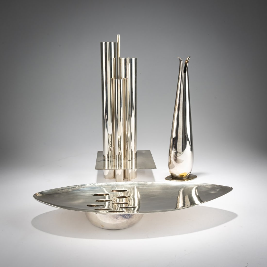 Lino Sabattini , Vase and rose vase, 1955-60: <p>H. 28 cm, H. 5 x 35.3 x 13.8 cm. <br />Christofle, Paris. <br />Silvered brass. <br />Marked: Knight, rooster, GALLIA, FRANCE PROD. CHRISTOFLE. </p>