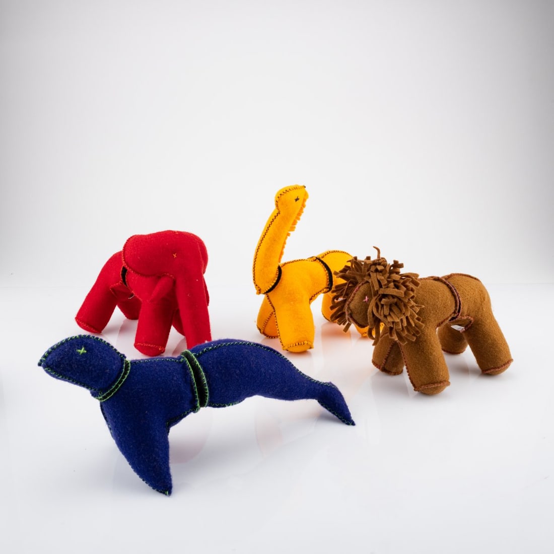 Vittorio Locatelli, Four animals 'I Ching' from the 'd. House' collection, 1990s: <p>H. 13.5 - 23 cm. <br />Driade, Corsico. <br />Woollen cloth, Velcro closure. <br />Marked: Manufacturer's label (4x).</p>