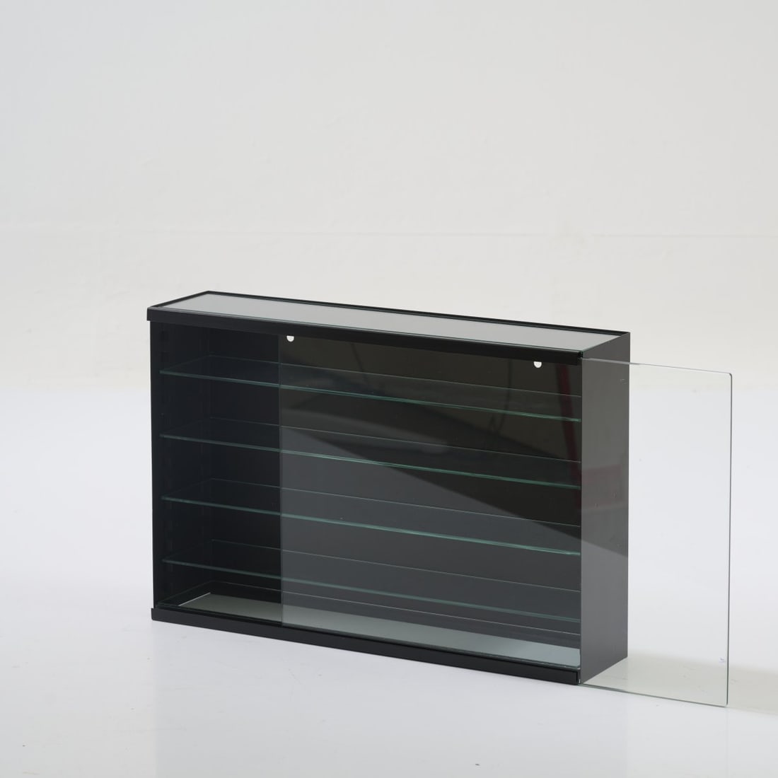 Bruno Munari, Small display 'Favignana', 1964 (design): <p>H. 30 x 45 x 10.5 cm. <br />Danese, Milan. <br />Sheet metal, black enamelled, glass. </p>