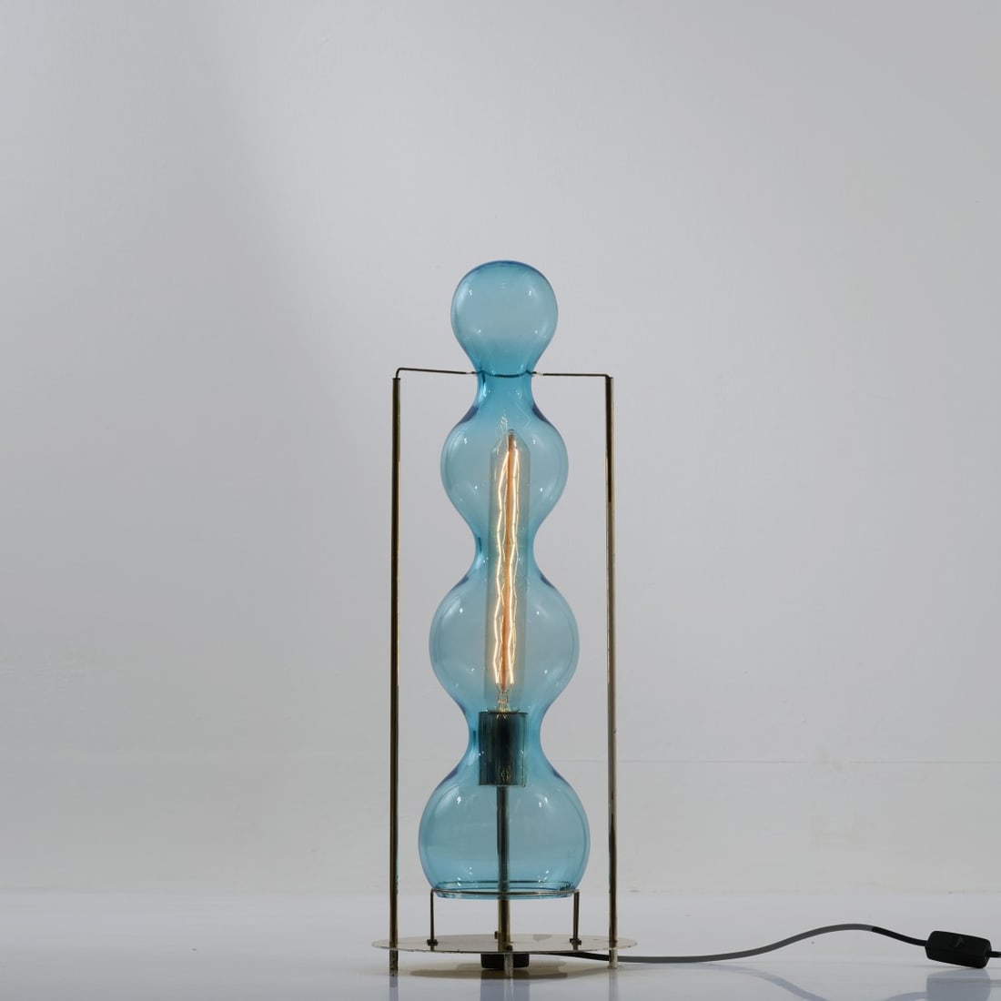 Jeannot Cerutti, Table light 'Star Trek', 1986: <p>H. 65 cm, &Oslash; 24.5 cm. <br />Veart, Murano. <br />Brass sheet, brass rods, silver-plated. <br />Marked: Manufacturer's label.</p>