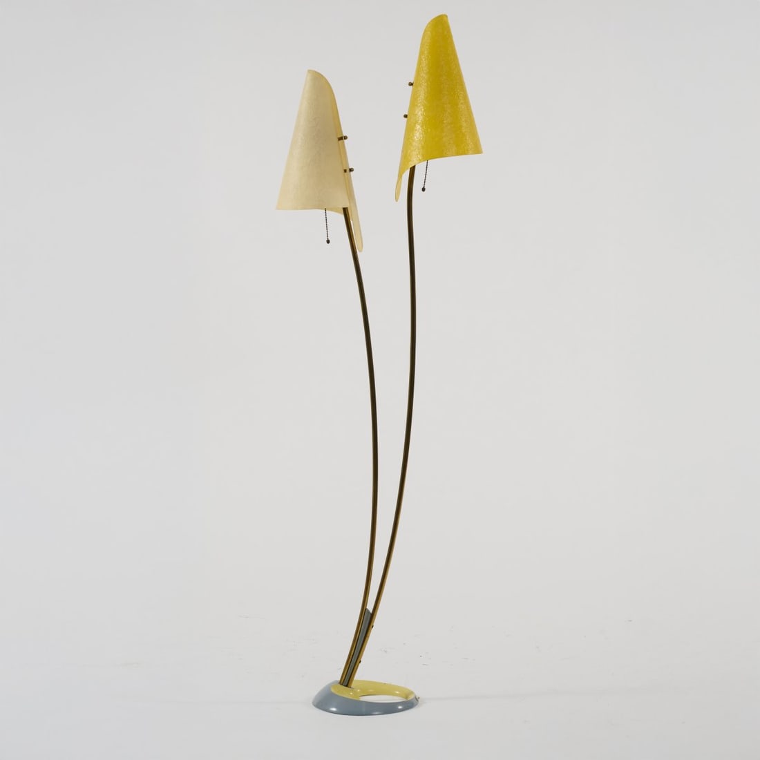 Cosack Brothers, Neheim-Hüsten (attributed), Floor lamp, 1950s: <p>H. 161.5 cm. <br />Cast metal, painted yellow and gray, brass tube, fiberglass-reinforced plastic shades, white and yellow.</p>