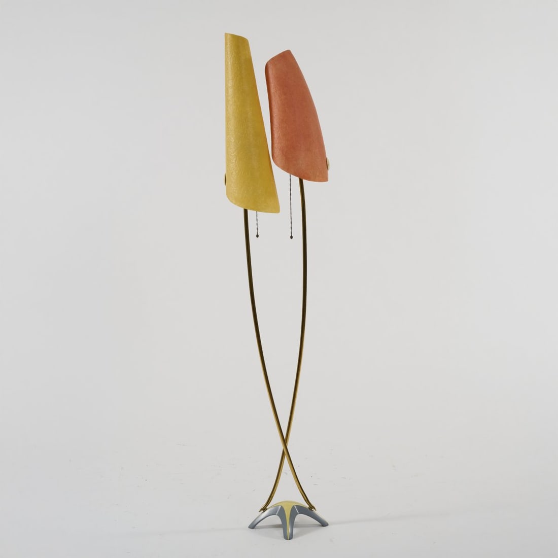 Cosack Brothers, Neheim-Hüsten (attributed), Floor lamp, 1950s: <p>H. 157 cm. <br />Cast metal, painted yellow and gray, brass tube, fiberglass-reinforced plastic shades, orange and yellow. </p>