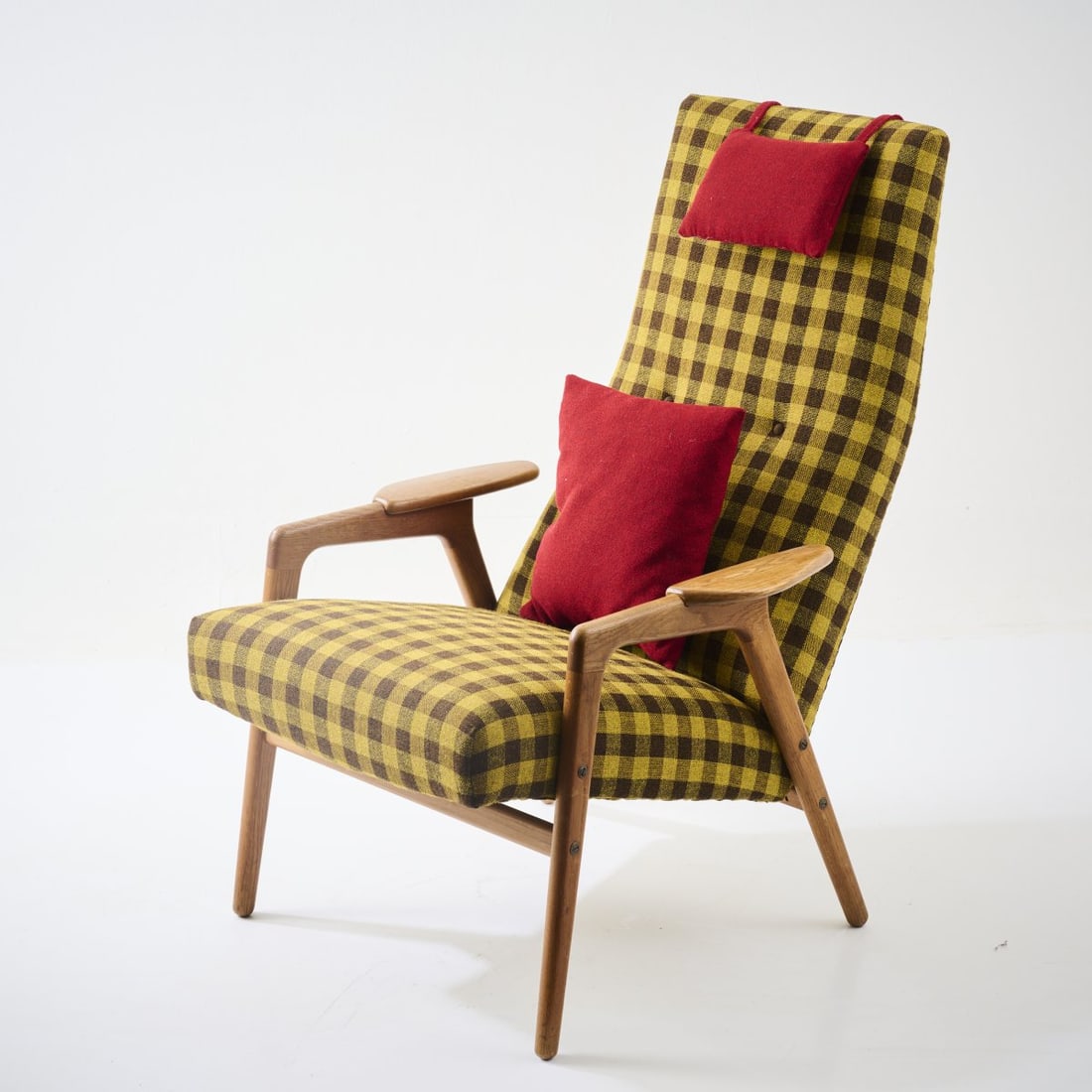 Yngve Ekstrom , 'Ruster' armchair, 1955: <p>H. 98 x 67.5 x 89.5 cm. <br />Swedese M&oslash;bler, Vaggaryd. <br />Oak wood, yellow-brown checkered and red textile fabric.