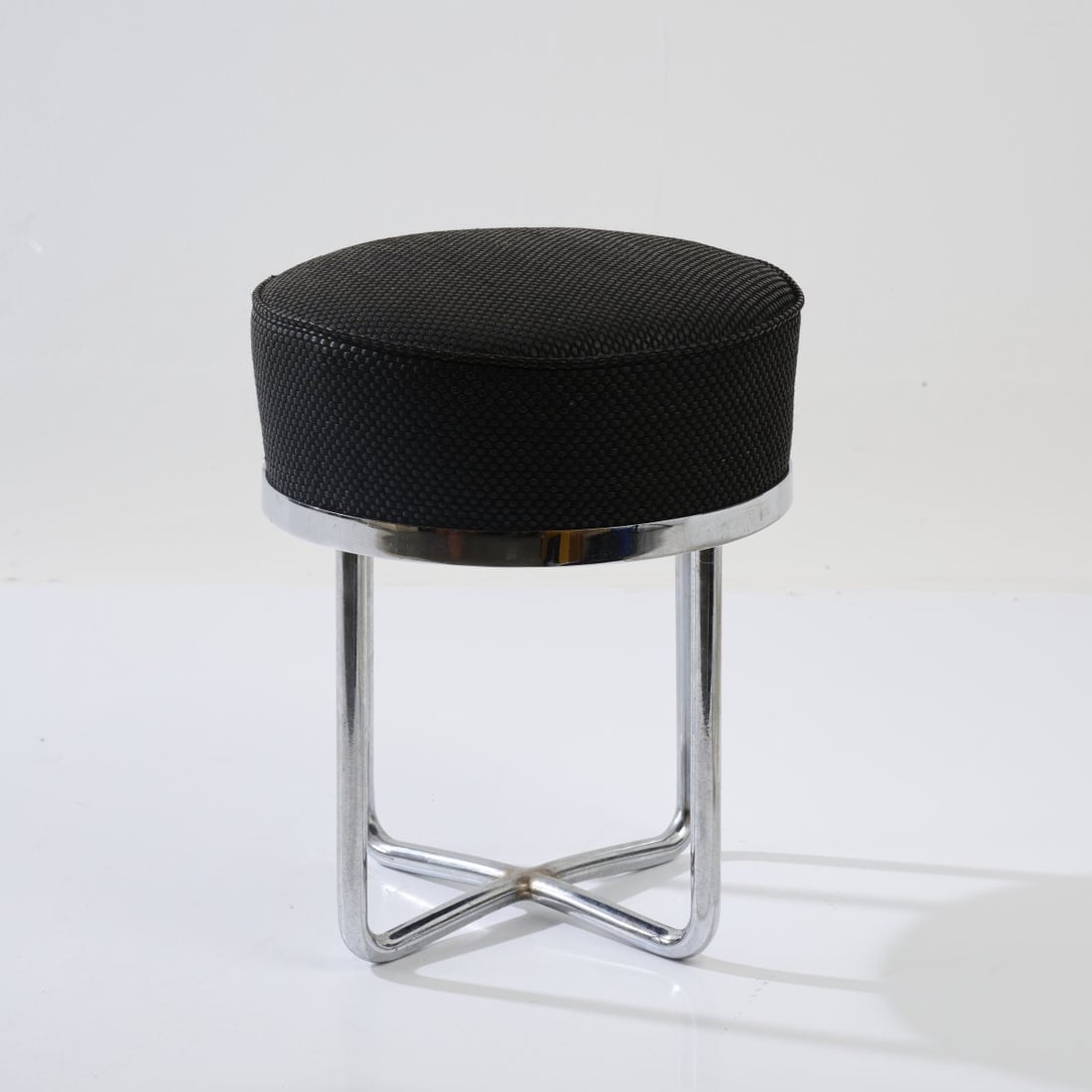 Germany, Stool, 1950s: <p>H. 50 cm, &Oslash; 40.5 cm. <br />Chrome-plated steel tube, braided leather straps, black.</p>