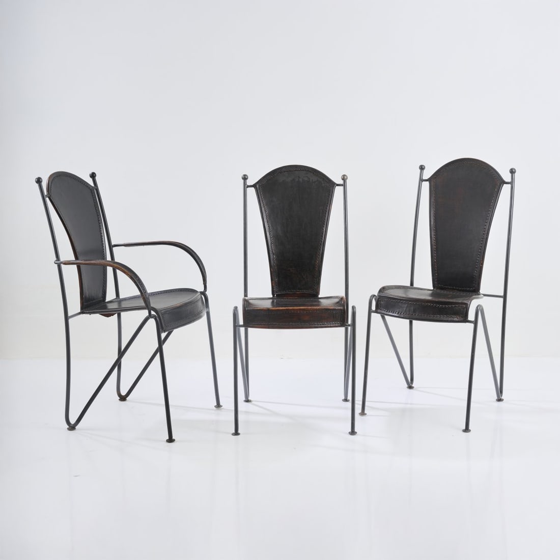 Jacques Adnet (after), Two chairs and one armchair, 1950s/60s (1 of 5)