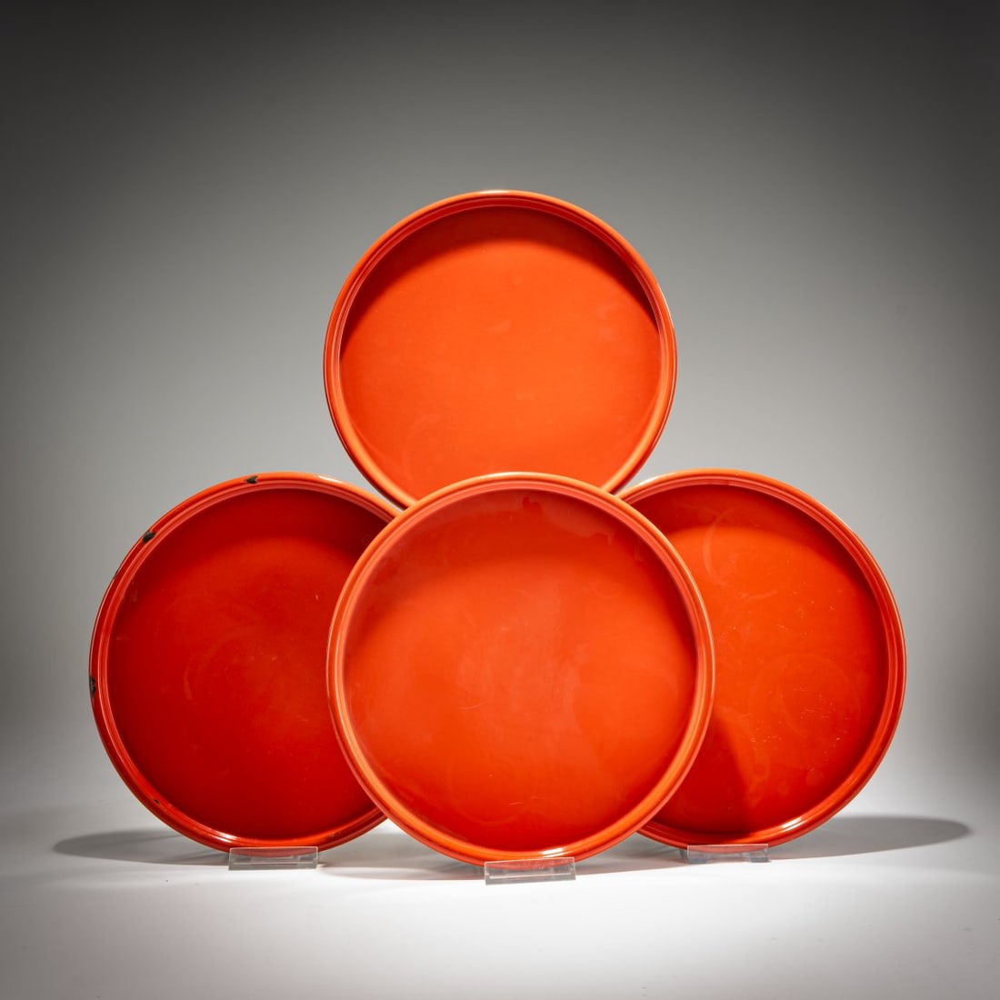 Verner Panton , Four trays, 1969 (design): <p>&Oslash; 27 cm. <br />Enamel factory Corg&eacute;mont, Corg&eacute;mont, Switzerland. <br />Sheet metal, enameled